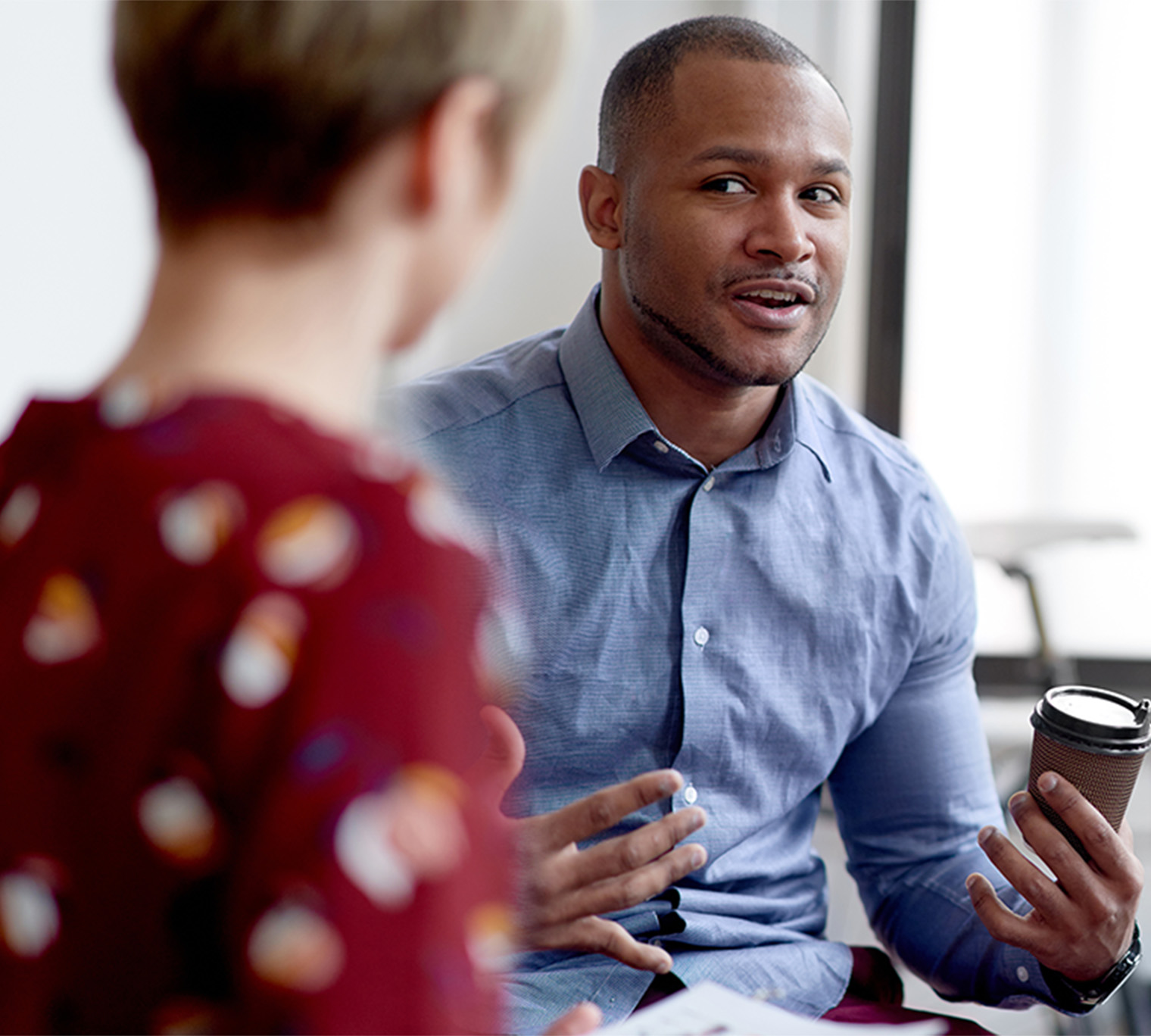 businessman leading a team of creative collaborating on a brainstorm project