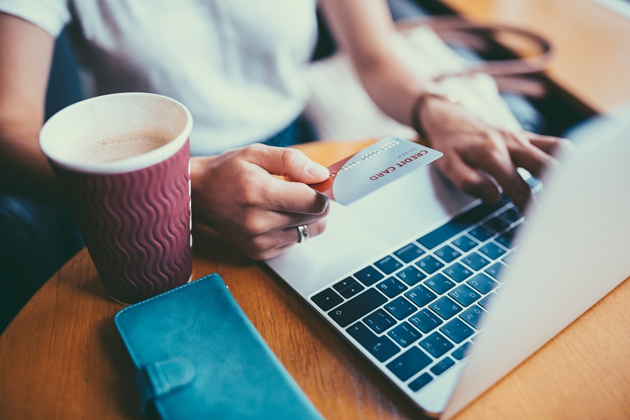 Person making online payment using credit card