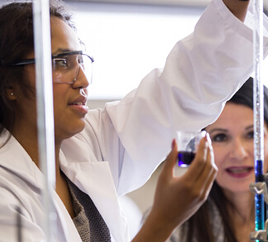 Woman working with lab equipment