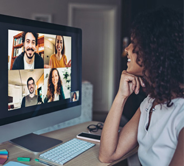 Woman in virtual meeting at home