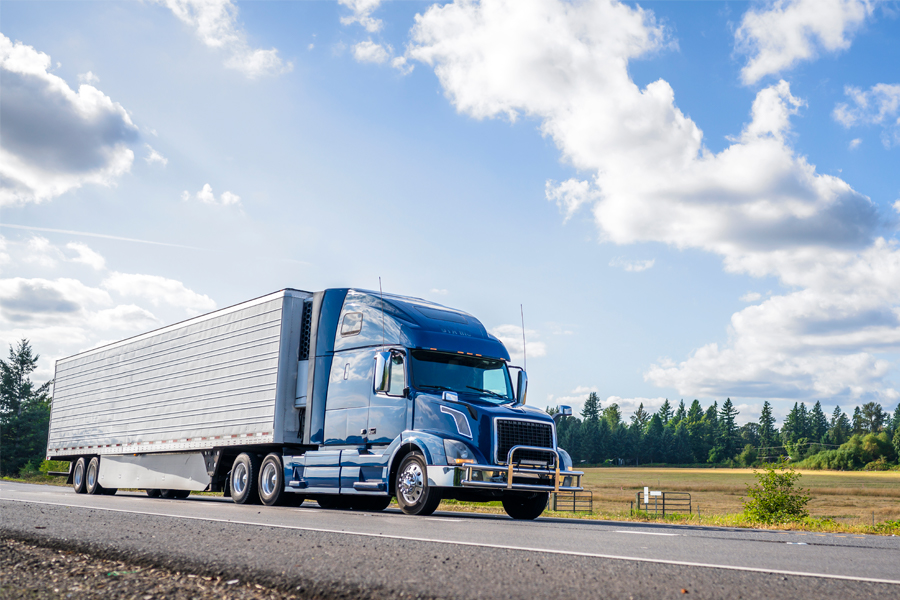 Semi-truck going down a highway