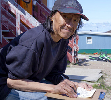 Inuit man drawing