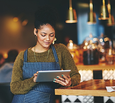Waitress using tablet