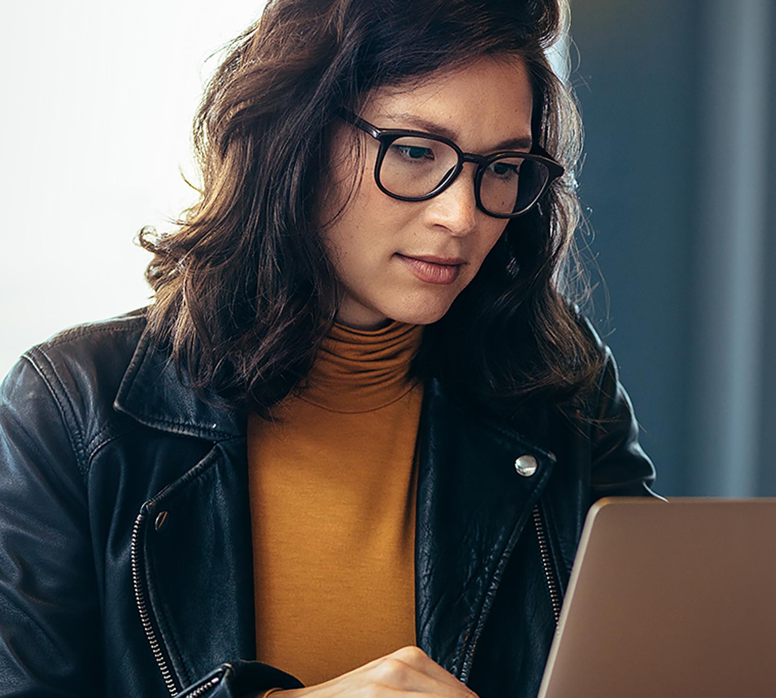 Business woman busy working on laptop computer at office.