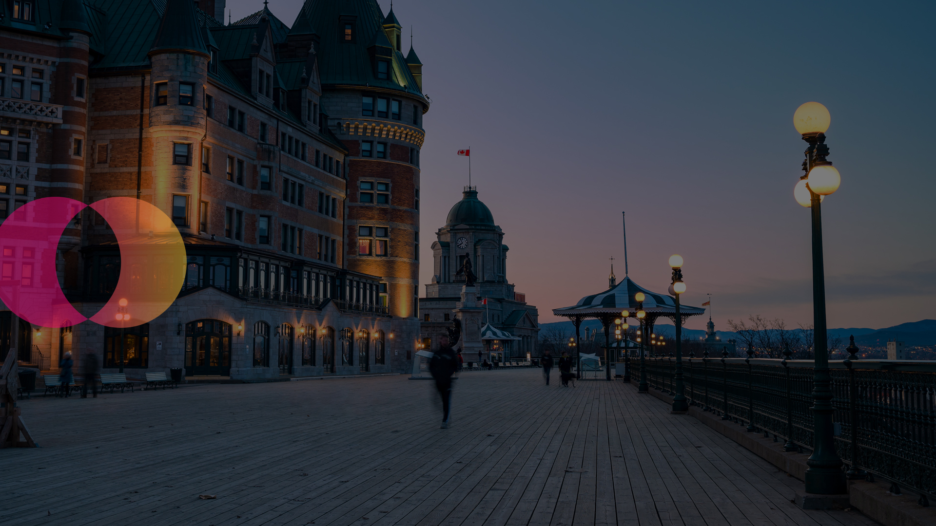 People walking on Dufferin terrace at dusk, close to Château Frontenac hotel, Quebec City, Quebec