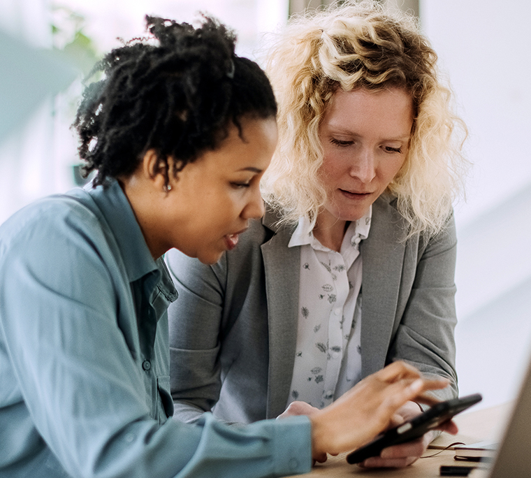 Two women training in office