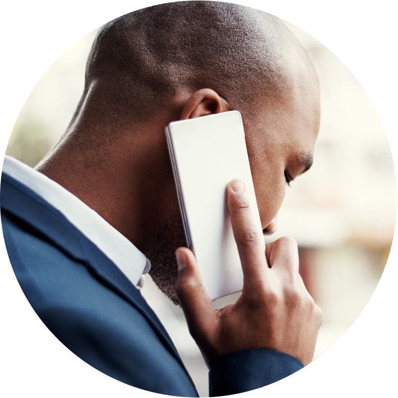 person facing away from camera while on a cell phone