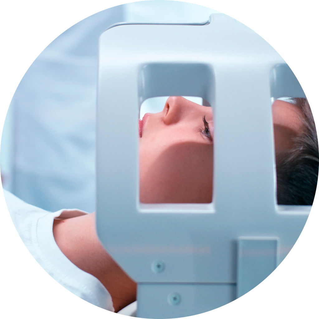 Younger person with their had in an MRI machine