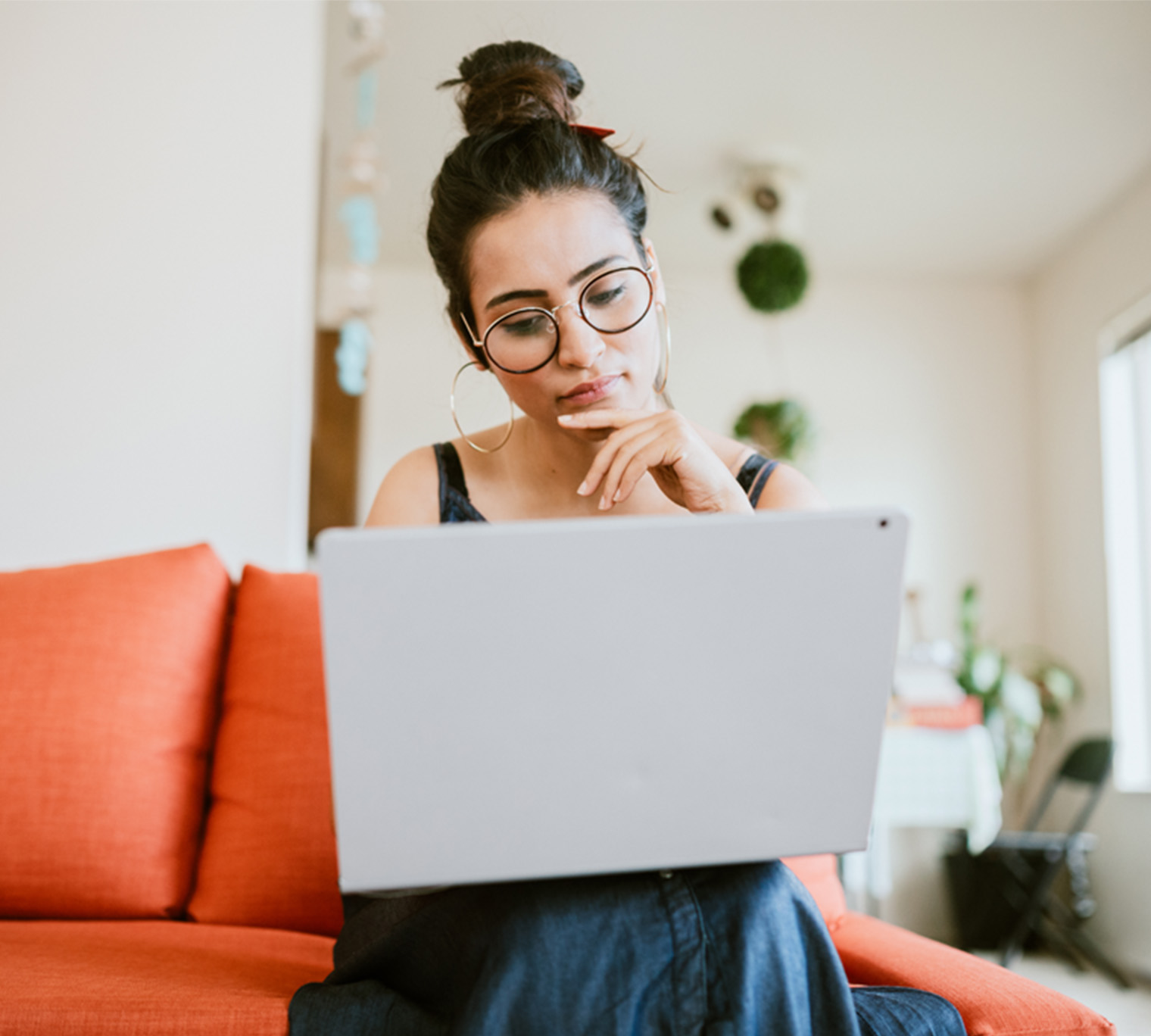 woman on computer, person on computer, girl looking at computer