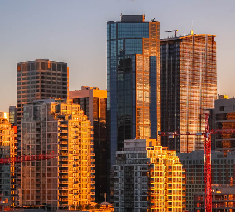 City skyline at sunset with some buildings under construction