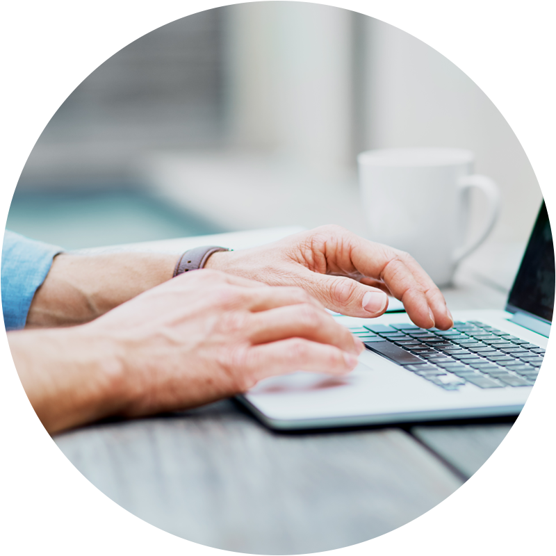 Hands on laptop keyboard