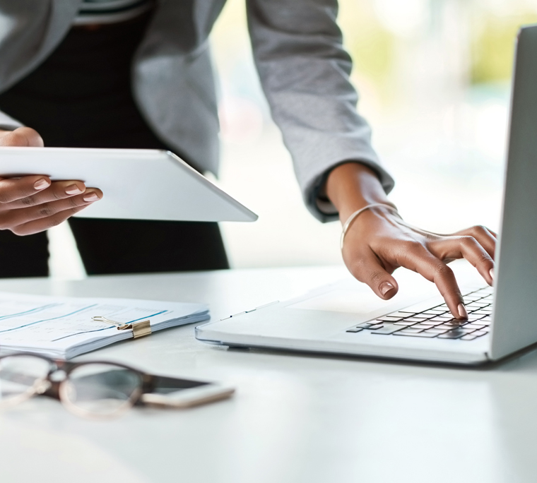 Close up view of hand on laptop keyboard
