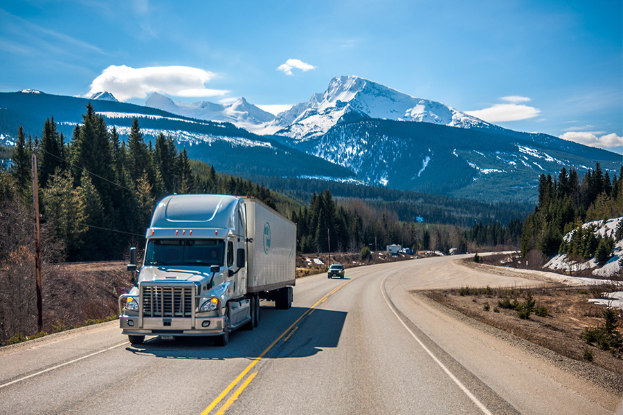 Truck on highway in the mountains