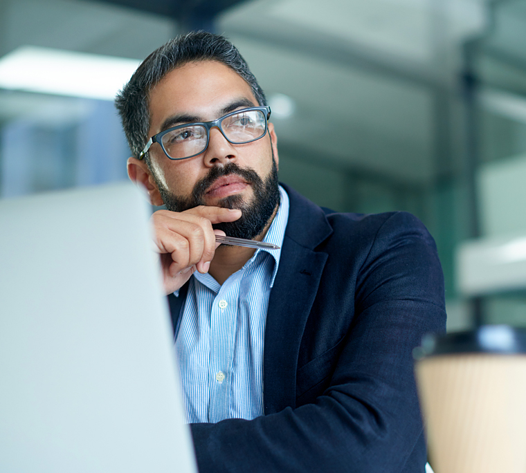 Looking up a glass office building