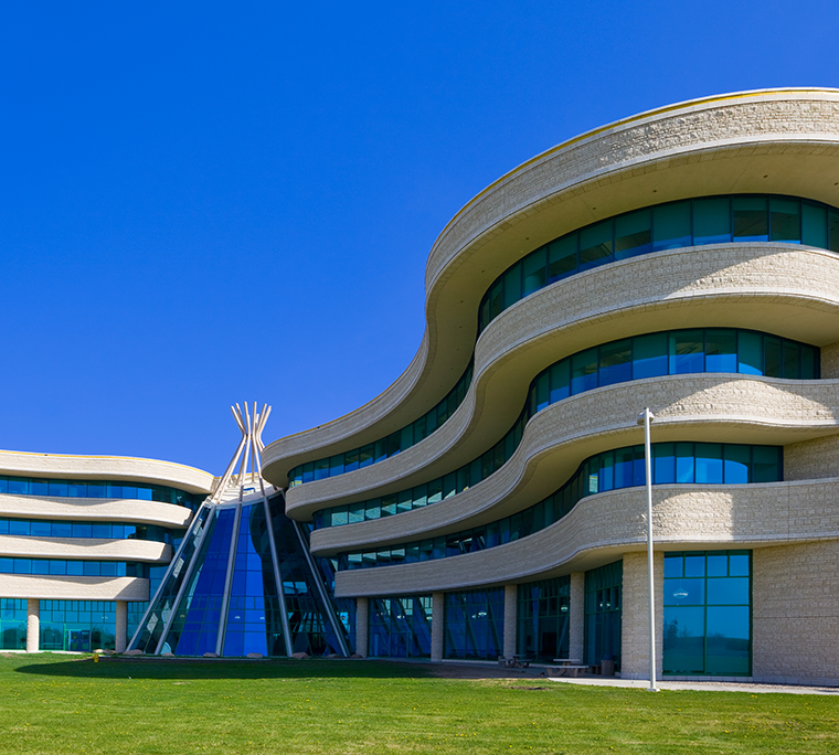 Looking up a glass office building