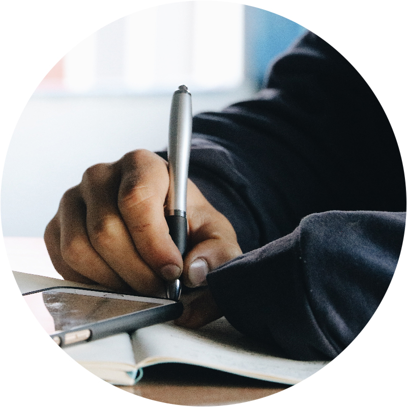 Close-up of hand taking notes