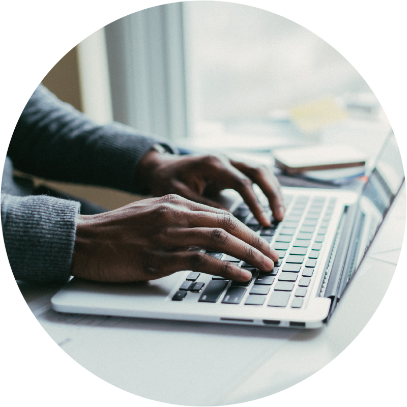 Hands on laptop keyboard