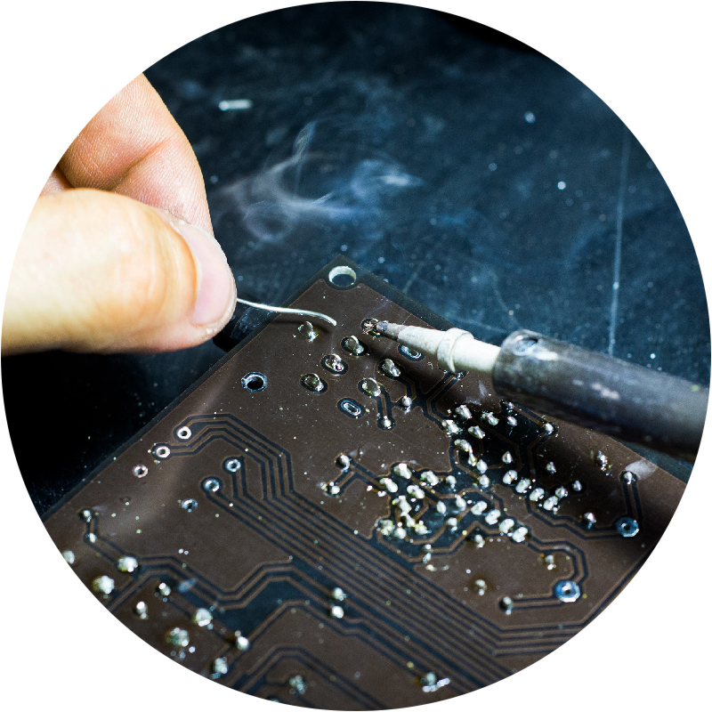 Close-up of hand and computer chip