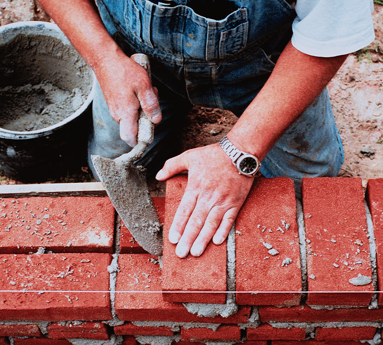 Man Laying Bricks