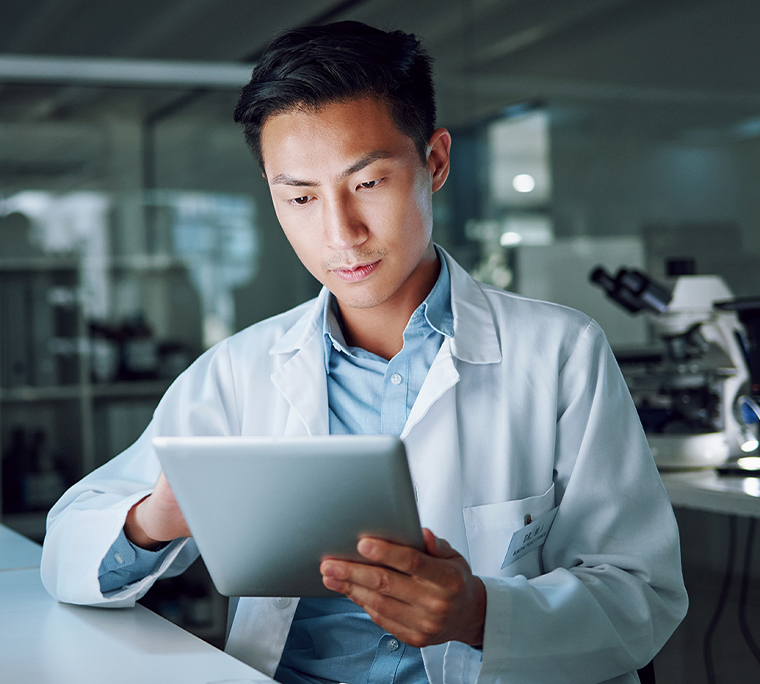 Lab technician using a tablet