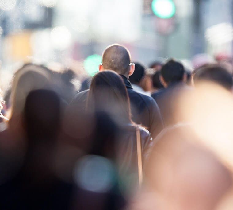 People walking a busy city street