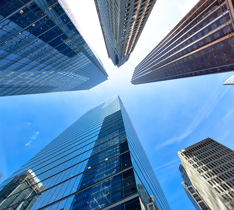 Looking up a glass office building