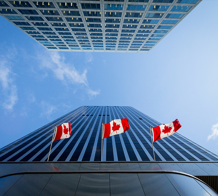 Looking up a glass office building