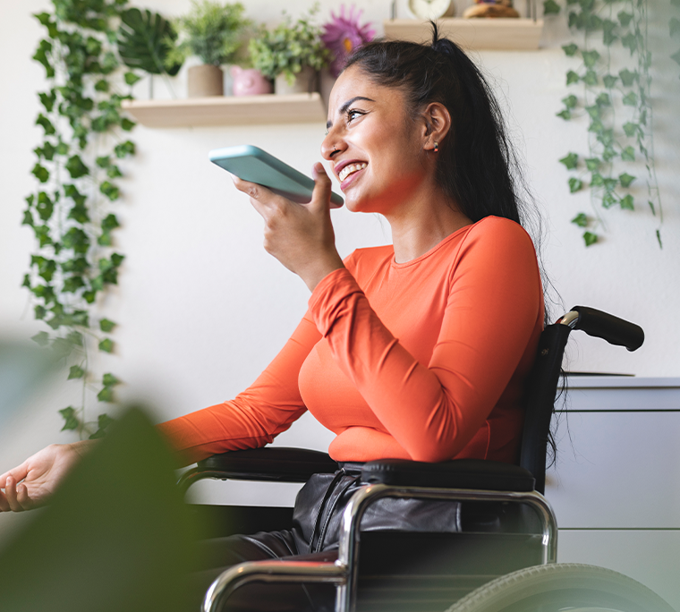 Woman in a wheelchair talking on a cellphone