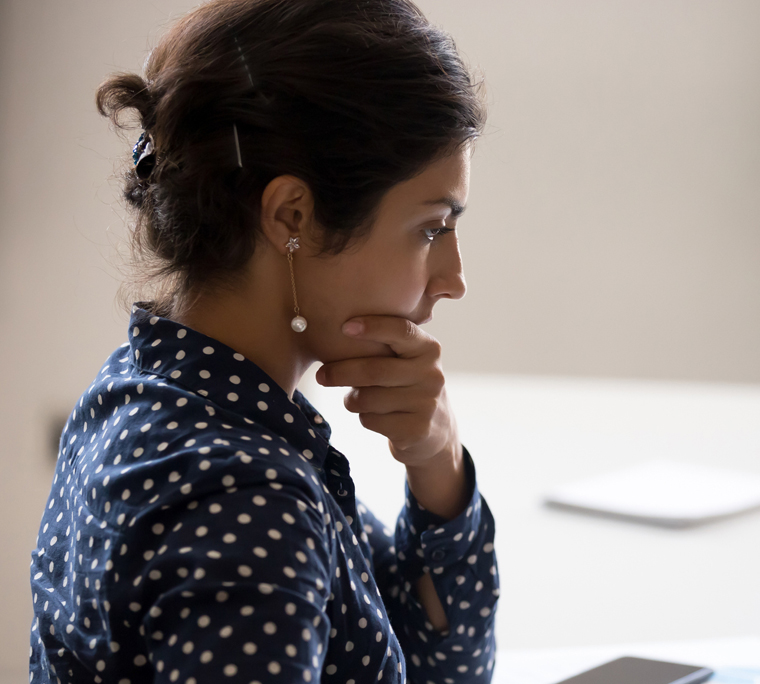 Woman in office analyzing results