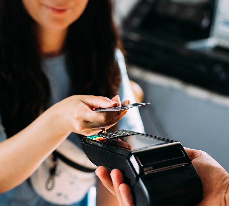 woman paying with credit card
