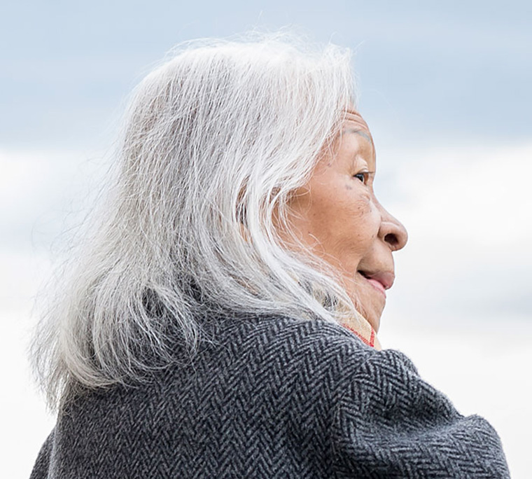 senior person admiring city scape